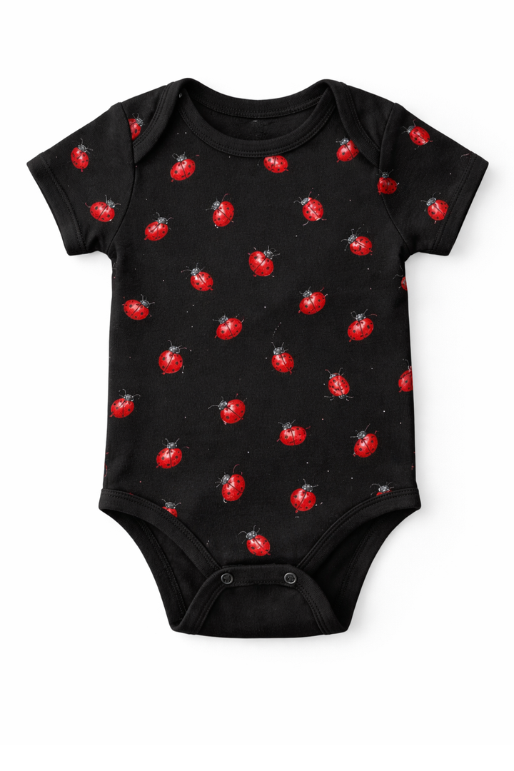 Black baby bodysuit with dtg printed repeating pattern design
